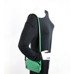 771321 GG Rubber Effect Leather Small Crossbody