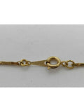 B Gold necklace Chanel