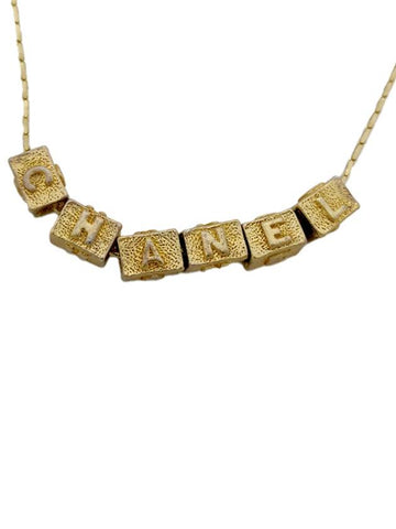 B Gold necklace Chanel